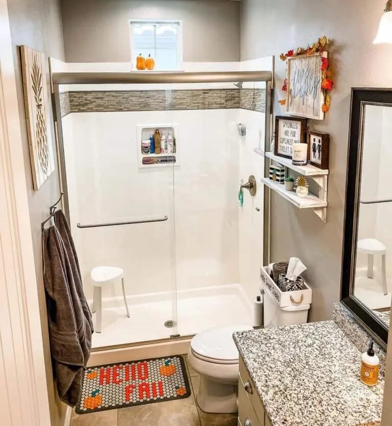 Brown Bathroom with Orange Accents