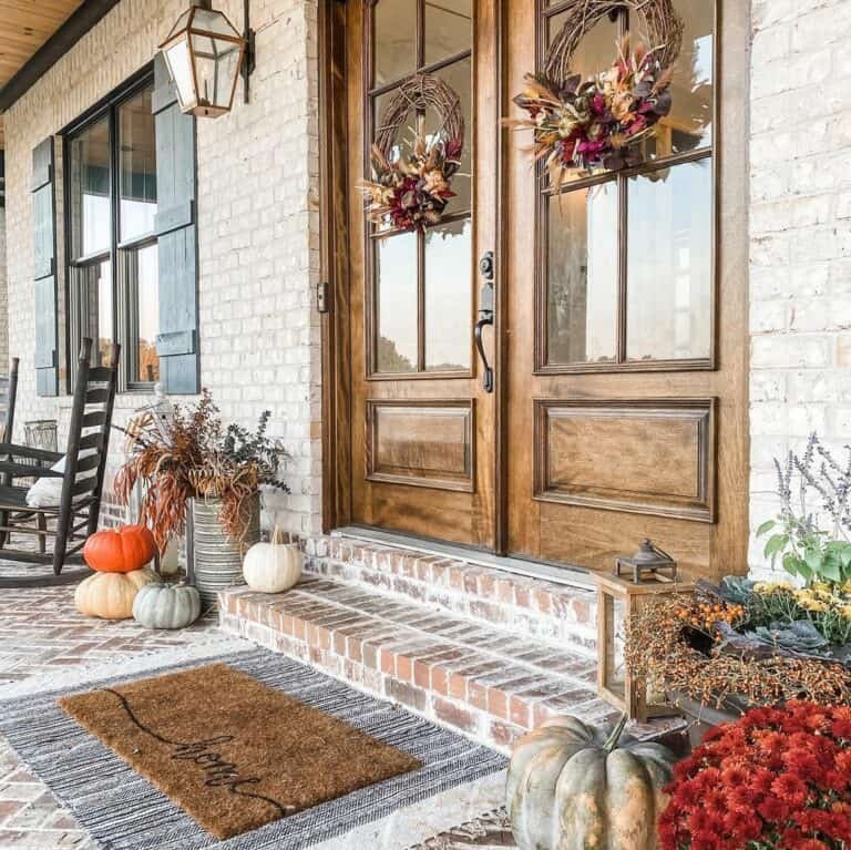 Brown Wreaths on Brick Door