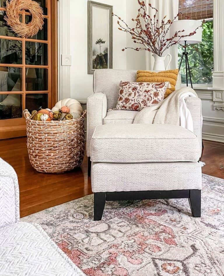 Gray Armchair and Pumpkins