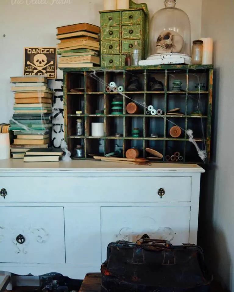 Eerie Decor on Vintage Cupboard