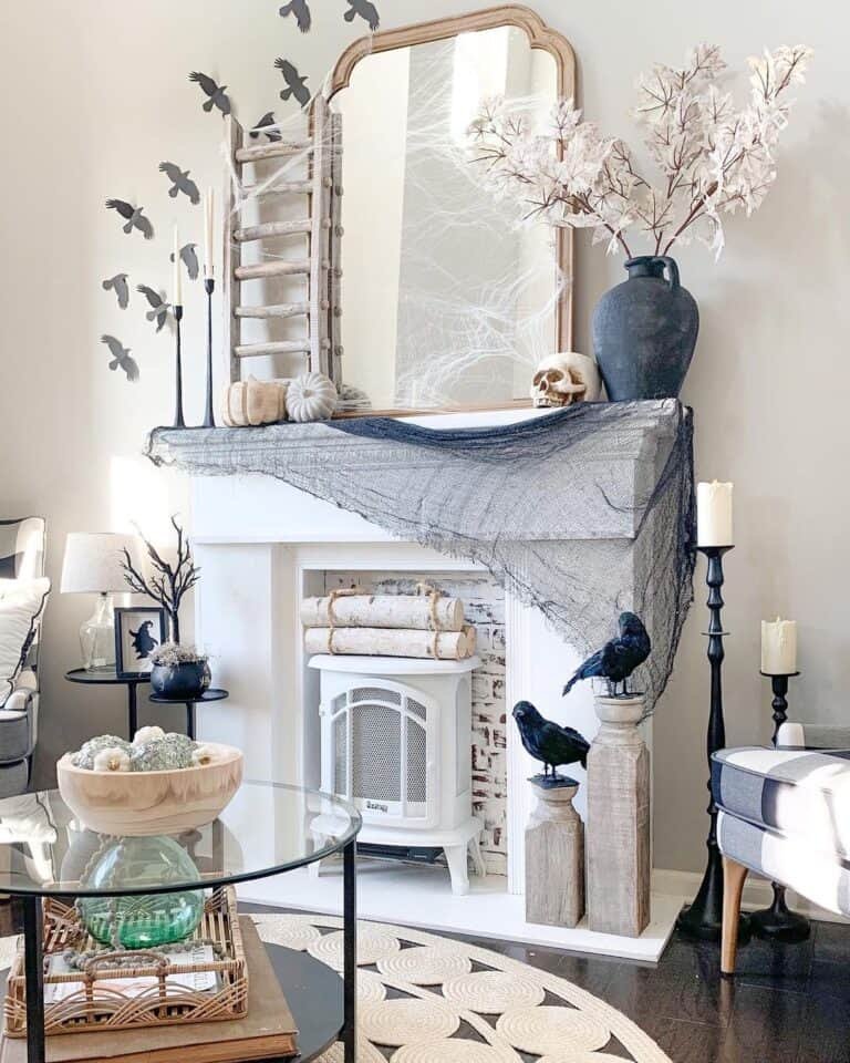 White Mantel with Crow Decor